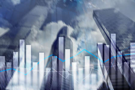 Financial graphs and charts on blurred business center background. Invesment and trading concept.の写真素材