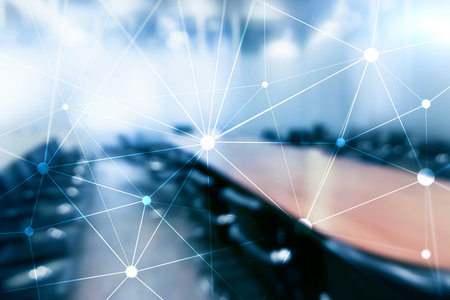 Blockchain network on blurred skyscrapers background. Financial technology and communication...