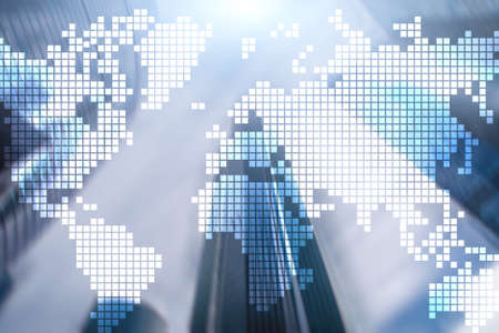 Double exposure world map on skyscraper background. Communication and global business concept.の写真素材