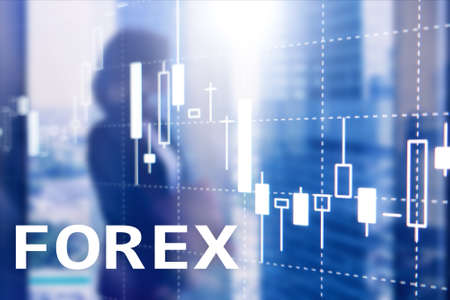 Forex trading, financial candle chart and graphs on blurred business center background.の写真素材