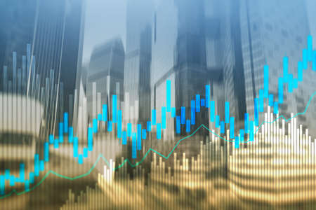 Stock trading candlestick chart and diagrams on blurred office center background.の写真素材