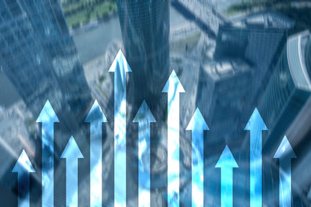 Up arrow graph on skyscraper background. Invesment and financial growth concept.の写真素材