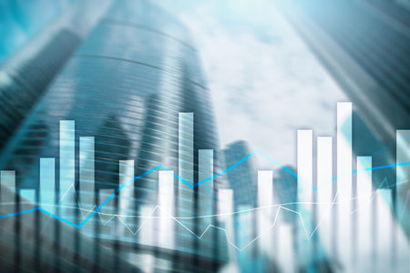 Financial graphs and charts on blurred business center background. Invesment and trading concept.の写真素材
