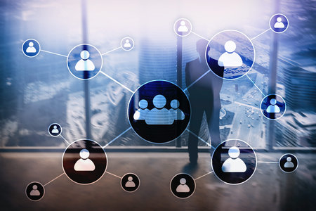 HR - Human resources management concept on blurred business center background.