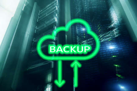 Backup button on modern server room background. Data loss prevention. System recovery.の写真素材