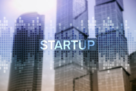Startup concept with double exposure diagrams blurred background.