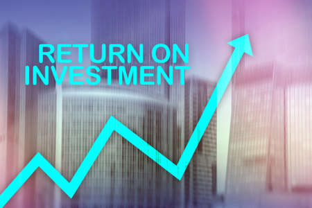 ROI - Return on investment. Stock trading and financial growth concept on blurred business center...
