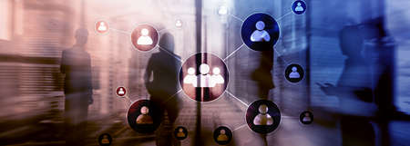 HR - Human resources management concept on blurred business center background.