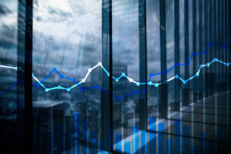 Double exposure financial graphs and diagrams.の写真素材