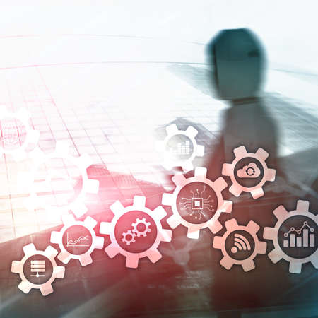 Automation technology and smart industry concept on blurred abstract background. Gears and icons.