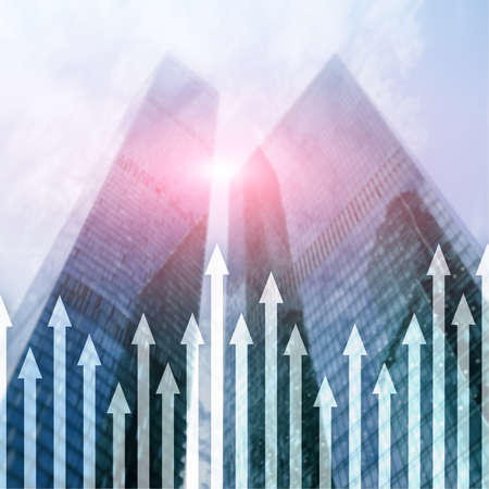 Up arrow graph on skyscraper background. Invesment and financial growth concept.の写真素材