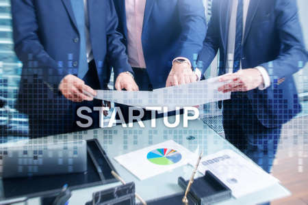 Startup concept with double exposure diagrams blurred background.の写真素材