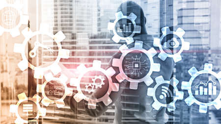 Automation technology and smart industry concept on blurred abstract background. Gears and icons.の写真素材