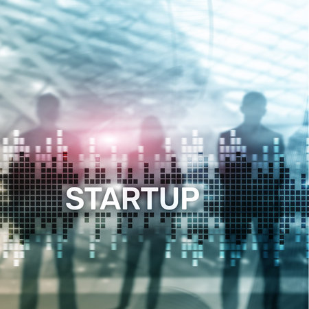 Startup concept with double exposure diagrams blurred background.