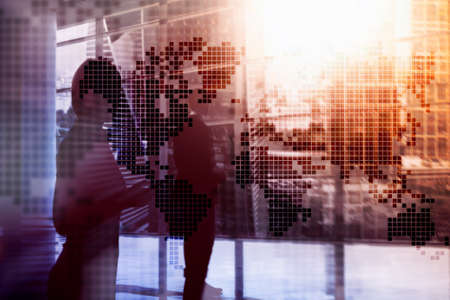 Double exposure world map. Global business and financial market concept.の写真素材