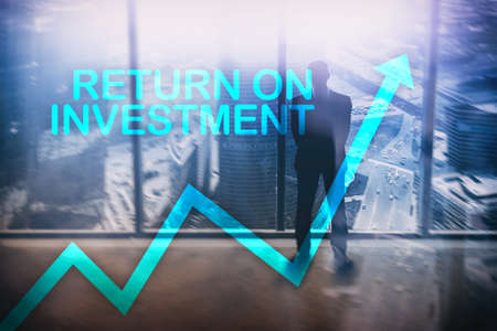 ROI - Return on investment. Stock trading and financial growth concept on blurred business center background.の写真素材