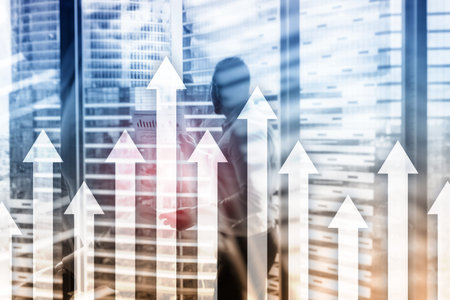 Up arrow graph on skyscraper background. Invesment and financial growth concept.