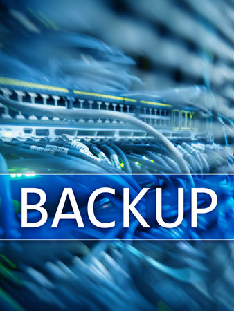 Backup button on modern server room background. Data loss prevention. System recovery.