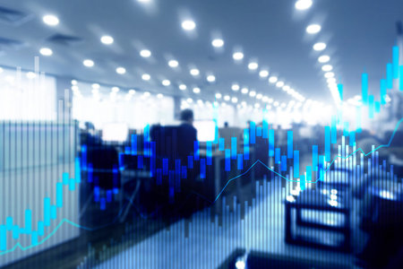 Stock trading candlestick chart and diagrams on blurred office center background.