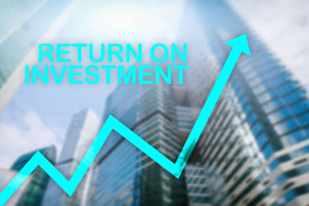 ROI - Return on investment. Stock trading and financial growth concept on blurred business center background.の写真素材