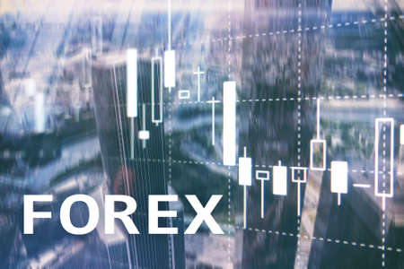 Forex trading, financial candle chart and graphs on blurred business center background.の写真素材