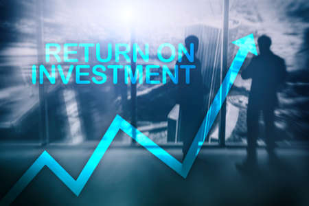 ROI - Return on investment. Stock trading and financial growth concept on blurred business center background.の写真素材