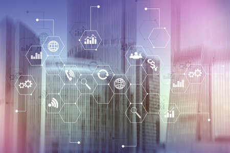 Double exposure mixed media. Diagrams and icons on hologram screen. Business people and modern city on background.の写真素材