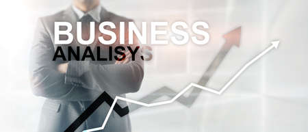 Business analysis diagrams and graphs on virtual screen. Financial and technology concept with blurred background.の写真素材