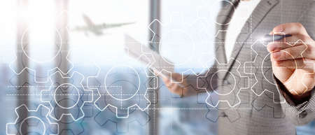 Double exposure gears mechanism on blurred background. Business and industrial process automation concept.の写真素材