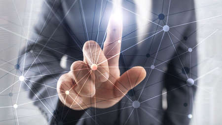 Blockchain network on blurred skyscrapers background. Financial technology and communication conceptの写真素材