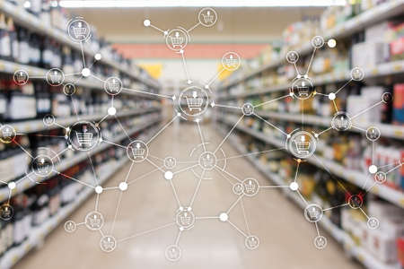 Shopping cart Ecommerce Marketing channel distribution concept on supermarket background.