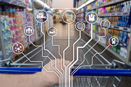Retail concept marketing channels E-commerce Shopping automation on blurred supermarket backgroundの写真素材