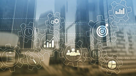 Business process automation concept. Gears and icons on abstract background.の写真素材
