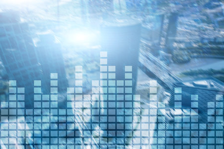 Financial chart on blurred skyscraper office backgroundの写真素材