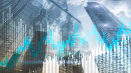 Stock trading candlestick chart and diagrams on blurred office center background.の写真素材