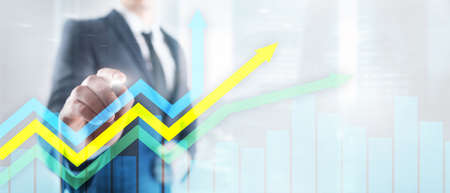 Financial growth arrows graph. Investment and trading concept.の写真素材