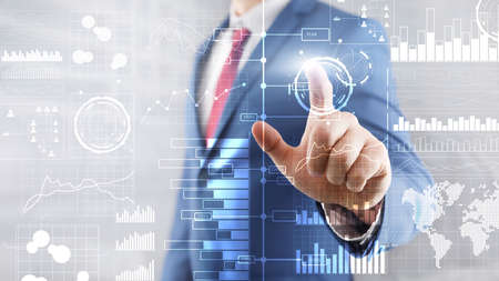 Presses a virtual button. Business intelligence. Diagram, Graph, Stock Trading, Investment dashboard...