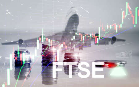 FTSE 100 Financial Times Stock Exchange Index United Kingdom UK England Investment Trading concept with chart and graphsの写真素材
