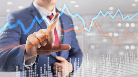 Business Financial Trading Investment concept graph virtual screen double exposure.の写真素材