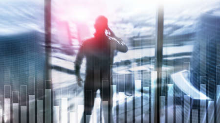 Business and finance graph on blurred background. Trading, investment and economics concept.の写真素材