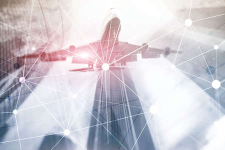 Blockchain network on blurred skyscrapers background. Financial technology and communication concept.の写真素材