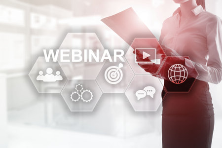 Webinar on virtual screen. Inscription on blurred office background.の写真素材