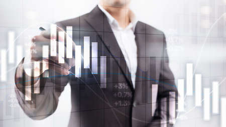 Financial Investment Concept. Stock market trading graph and candlestick chart.の写真素材