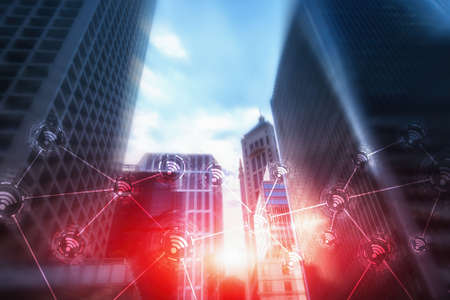 Wi-fi icon on the modern city of the future. Wireless network connection. Hong Kong abstract image.の写真素材