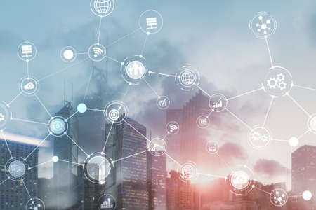 Smart City and Wireless Communication Network. Business District with office building. IOT modern technology concept.の写真素材