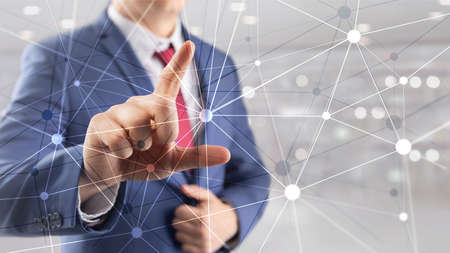 Blockchain network on blurred skyscrapers background. Financial technology and communication...