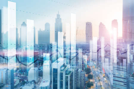 Sell and Buy. Financial stock trading graph chart diagram on blurred office background