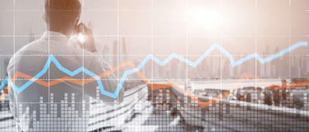 Business Financial Trading Investment concept graph virtual screen double exposure.の写真素材