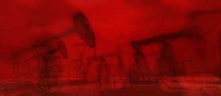 Oil derricks against the sky. Oil rig pump double exposureの写真素材