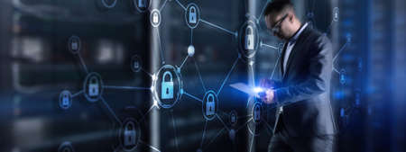 Security data protection concept. Businessman protecting data personal information on tablet and virtual interface.の写真素材